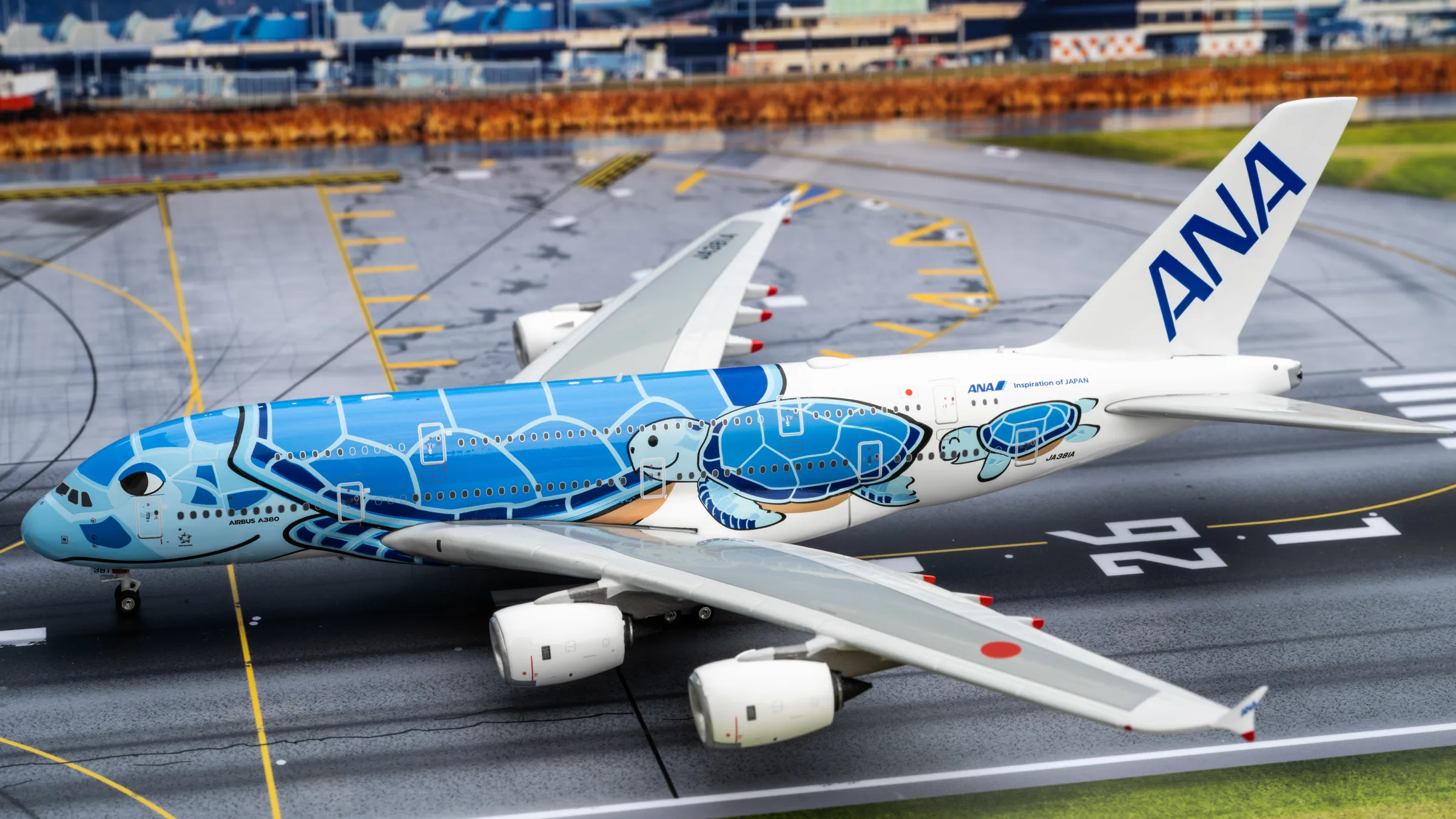 1:400 scale model of ANA's blue Flying Honu Airbus A380 on the home runway